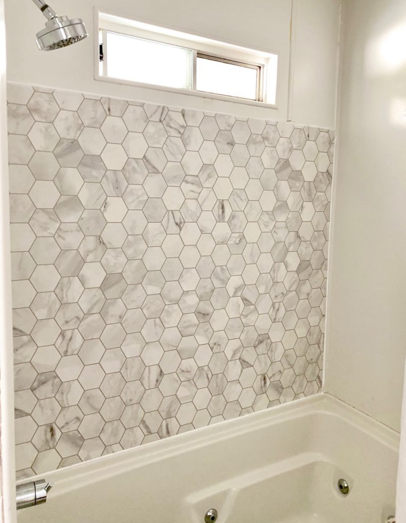 how to repair a single bathtub surround wall