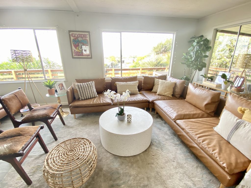 CB2 white stone round coffee table